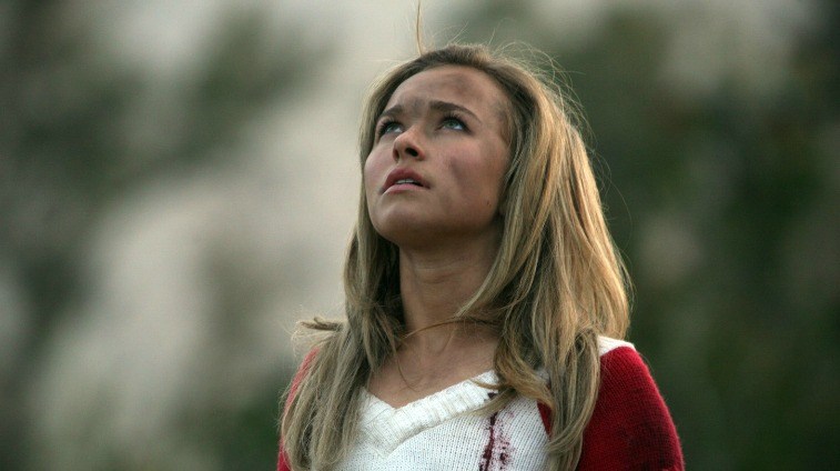 Hayden Panettiere as cheerleader Claire Bennet looks up into the sky with dirt on her face on Heroes