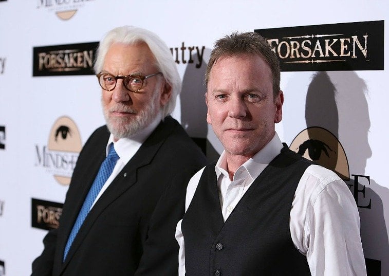 Donald Sutherland and Kiefer Sutherland in front of a white backdrop