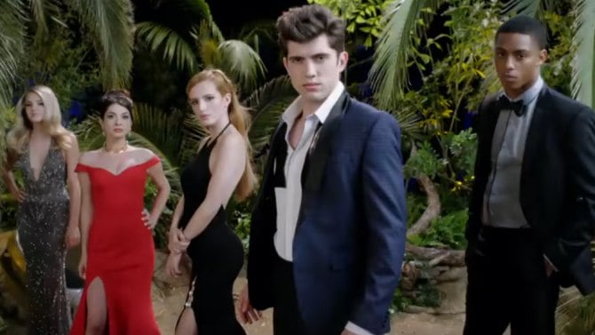 The cast of Famous in Love pose in formation in front of trees