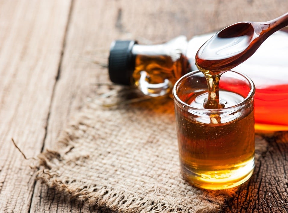 Maple syrup in glass bottle