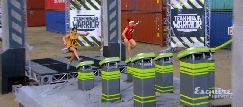 Erica Cook and Jeri D'Aurelio are running up steps next to each other on the course of Team Ninja Warrior.