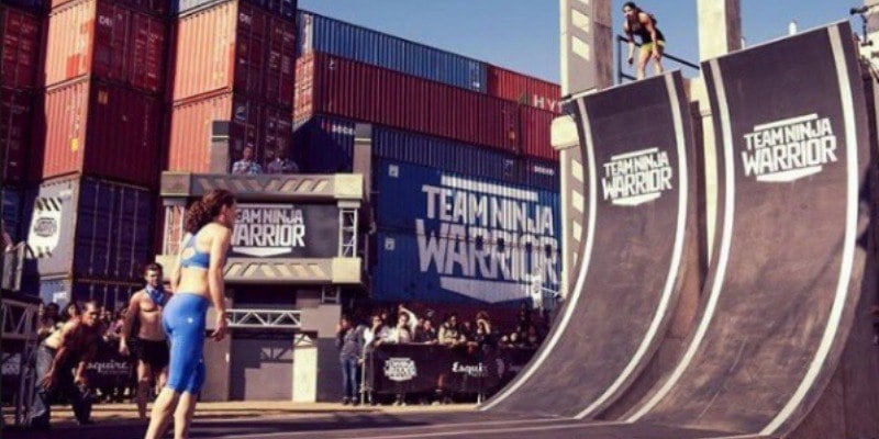 Tiana Webberly is on top of the warped wall looking down at Rose Wetzel.