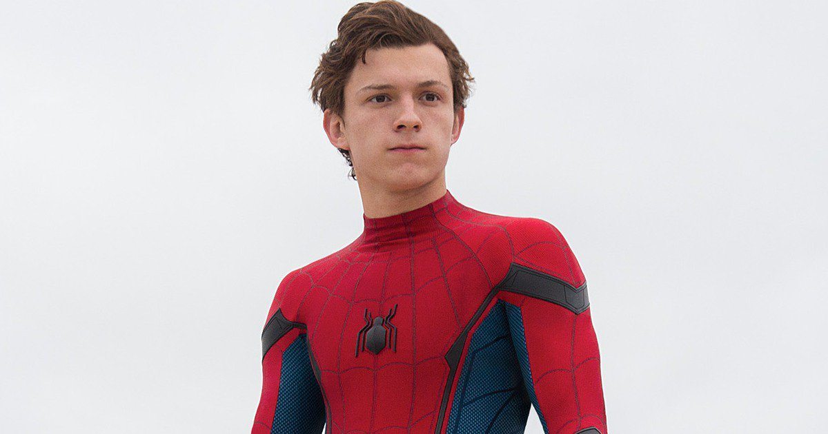 Tom Holland posing in a Spider-Man suit