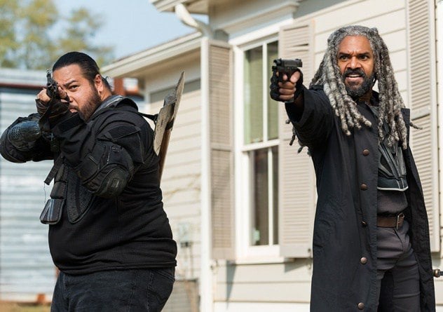 Ezekiel aims his gun in a scene from Season 7 of 'The Walking Dead.'