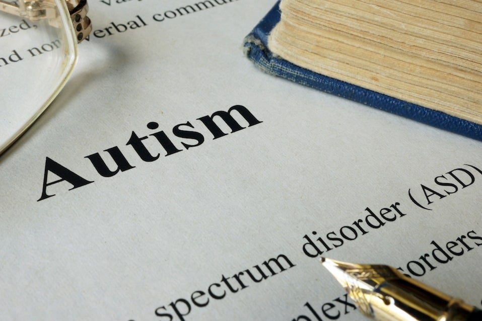 Autism spectrum disorder ASD written on a paper. Autism spectrum disorder ASD written on a paper.
