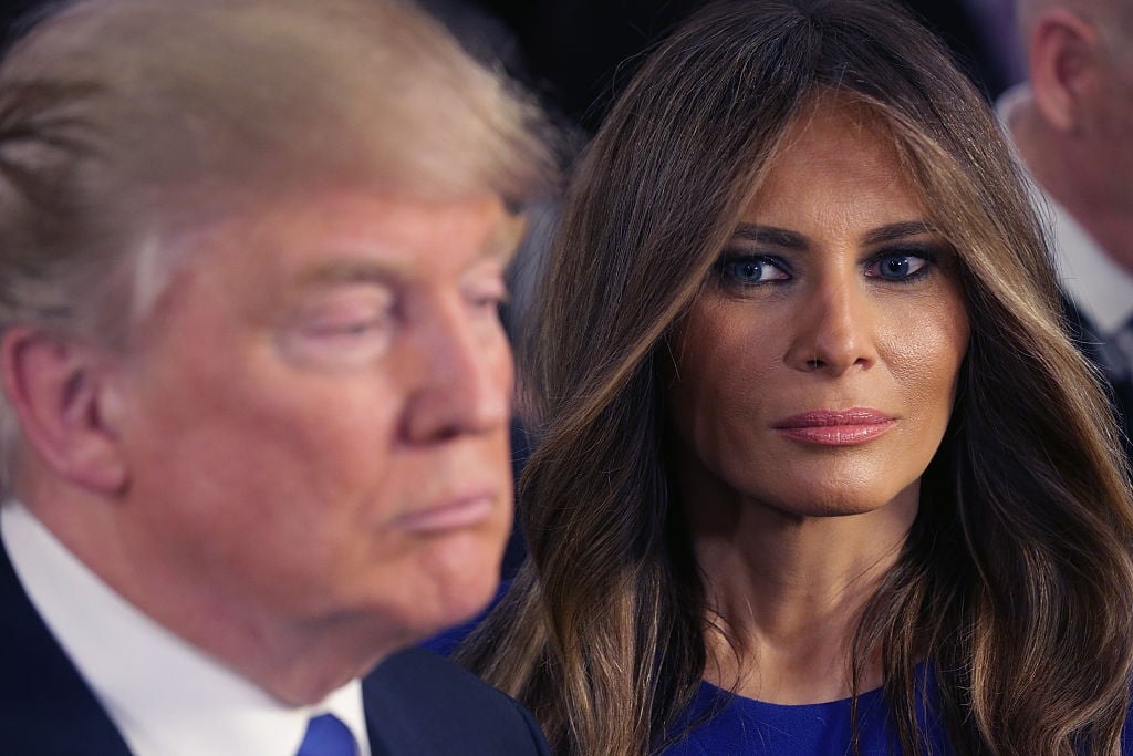 Trump and his wife Melania greet reporters