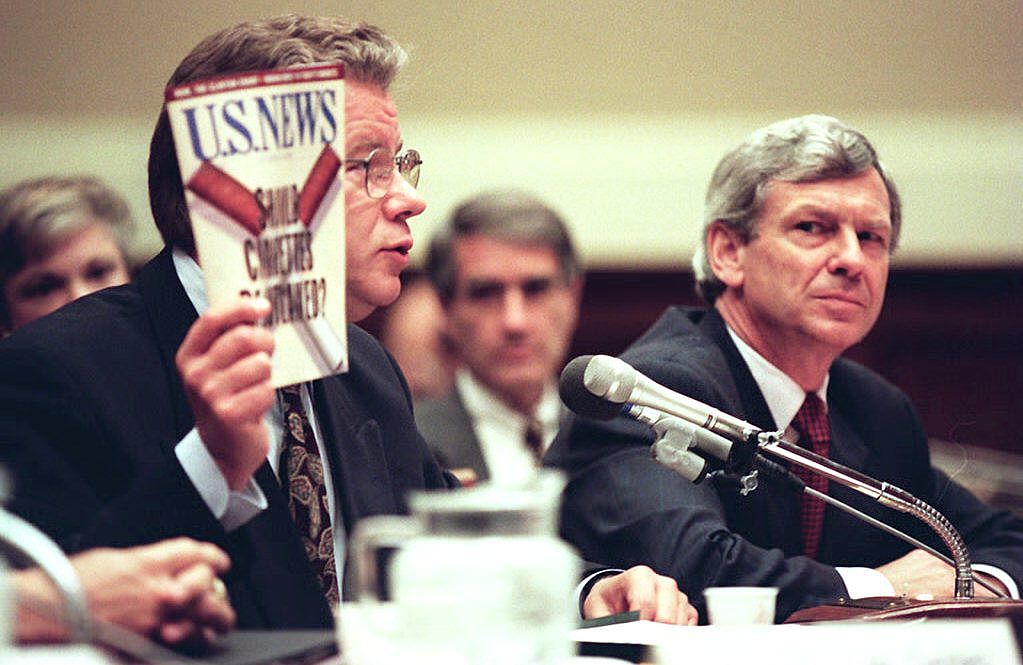 James Johnston, then-chairman and chief executive of R.J. Reynolds Tobacco Company, holds up a recent copy of U.S. News and World Report.