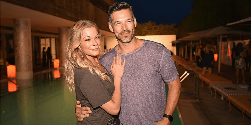 Leanne Rimes and Eddie Cibrian and posing together. Leanne Rimes and Eddie Cibrian and posing together.