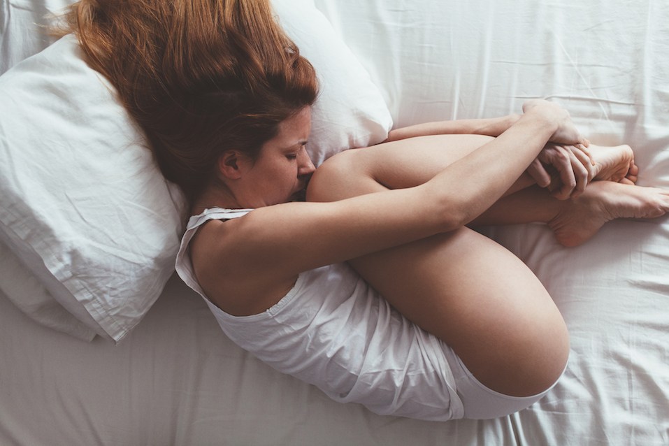 Lying down and sad