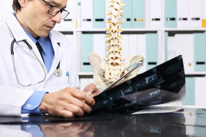 Radiologist doctor checking xray