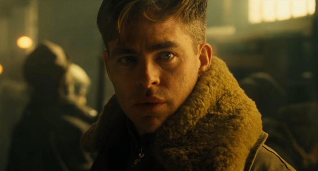 Steve Trevor in a fleece-lined jacket, looking at the camera