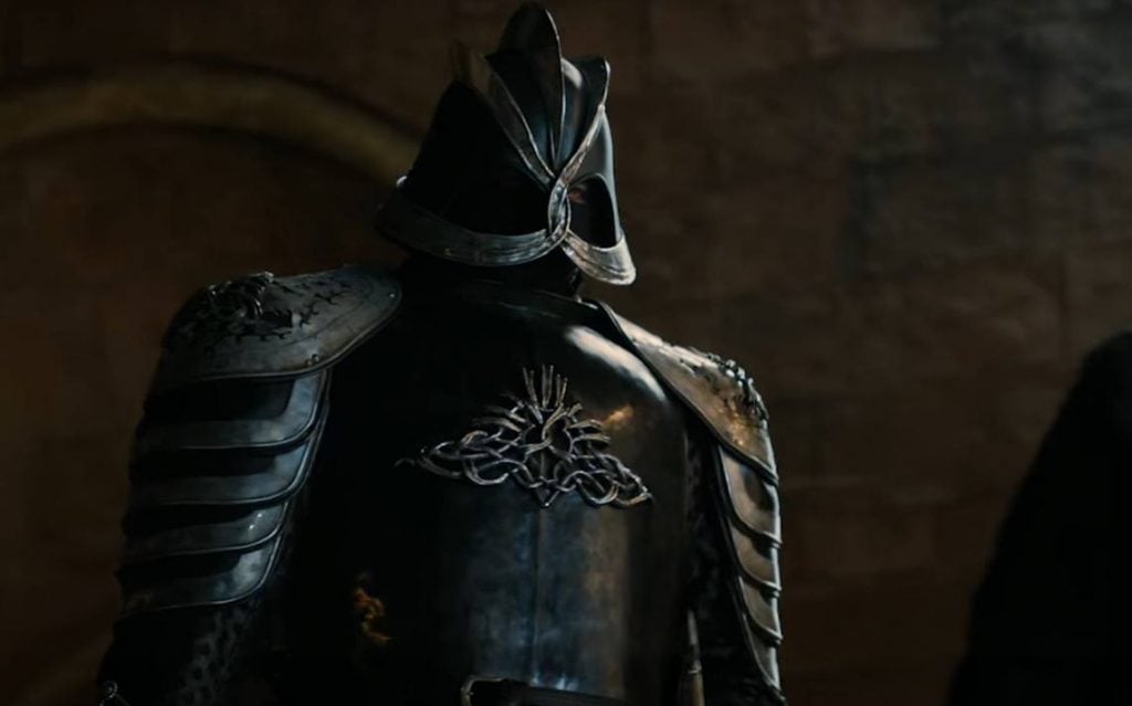 Gregor Clegane in full armor, standing tall and looking down