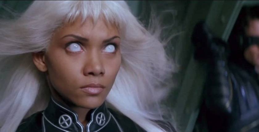 Halle Berry as Storm, with her eyes completely white, and looking off into the distance