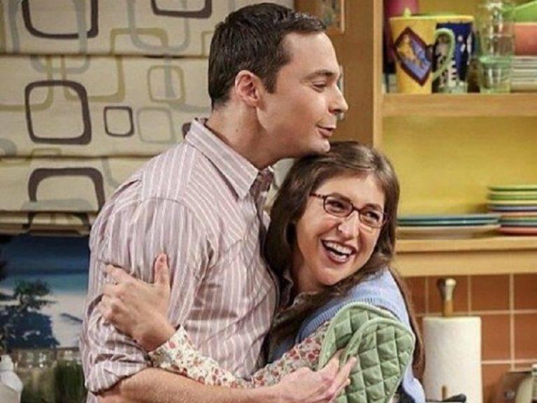 Sheldon and Amy hug each other in The Big Bang Theory