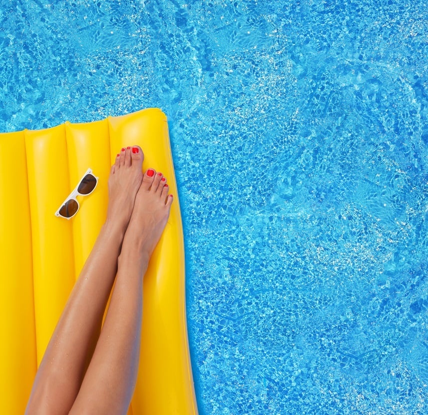 Woman relaxing in a pool