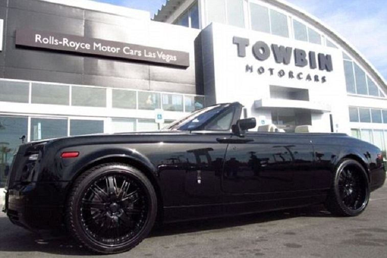 View of Rolls Royce Phantom Drophead with top down in profile