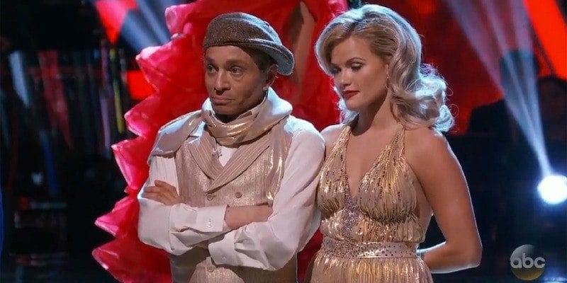 Chris Kattan and Witney Carson are standing and looking unhappy as they are eliminated. Chris Kattan and Witney Carson are standing and looking unhappy as they are eliminated.