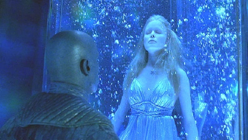 Arnold Schwarzenegger, as Mr. Freeze, looks at his frozen wife in 'Batman and Robin'