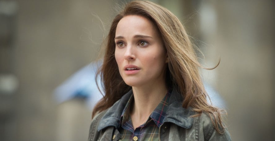 Natalie Portman, wearing a jacket, and looking concerned off into the distance