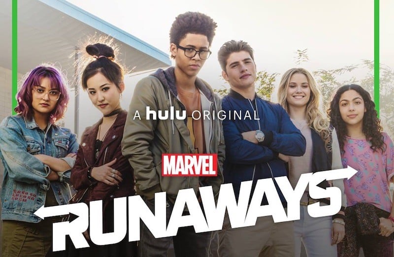 The cast of the Runaways stands together in a line