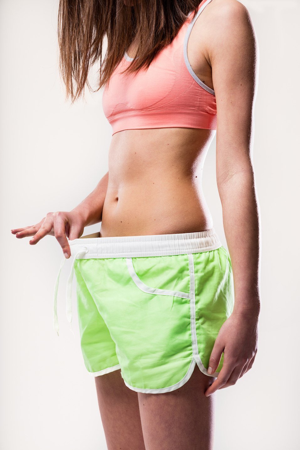 woman looking in her shorts