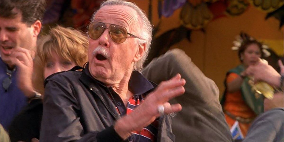 Stan Lee looking up, shocked in a crowd