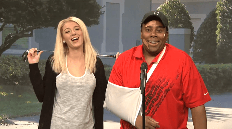 Blake Lively standing next to Kenan Thompson, who has a golf club bent over his head.