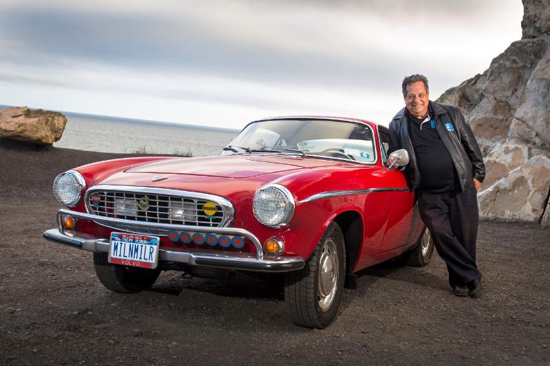 Photo of Irv Gordon and the 1966 Volvo that passed the three-million mile mark