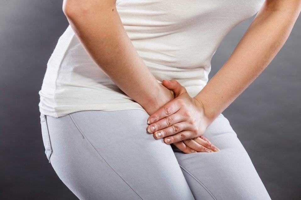 woman having to urinate 