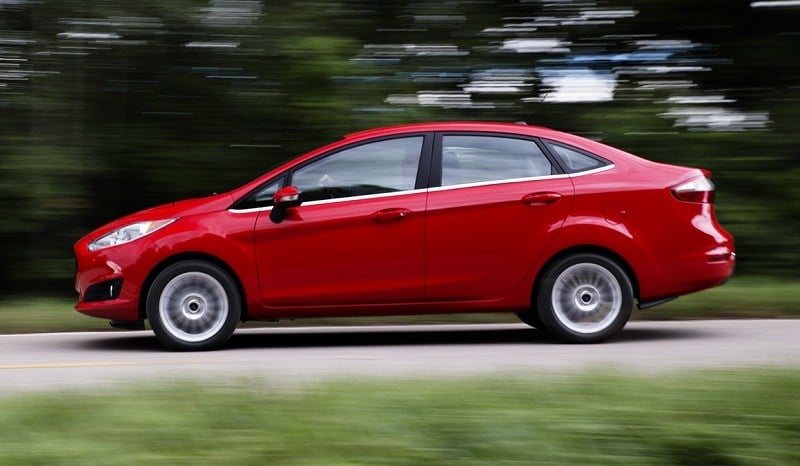 Side view of red Fiesta sedan from 2013 model year