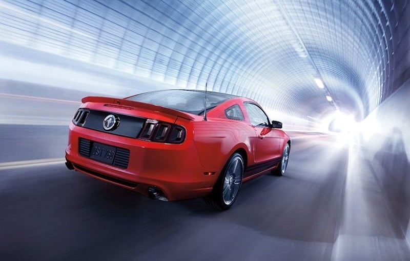 Rear three quarter shot of red 2014 Ford Mustang coupe
