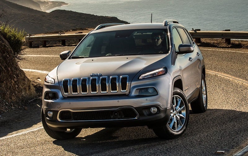 View of 2017 Jeep Cherokee Limited on a winding coastal road