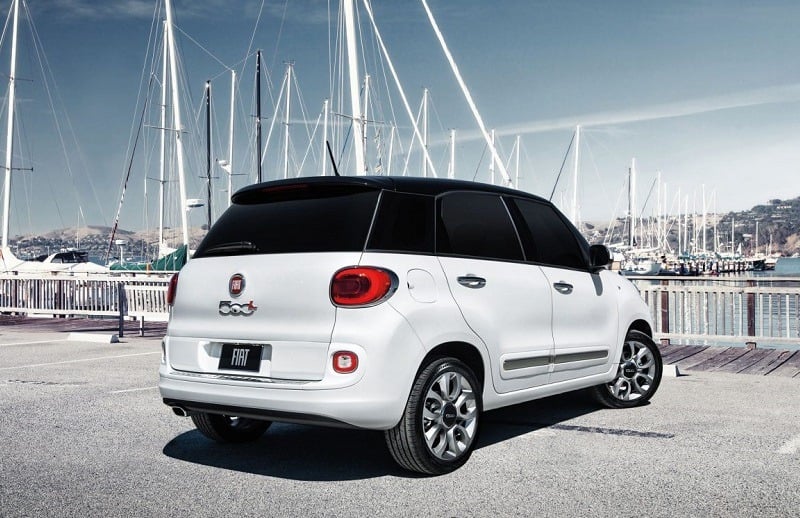 Rear view of whit Fiat 500L parked at a marina
