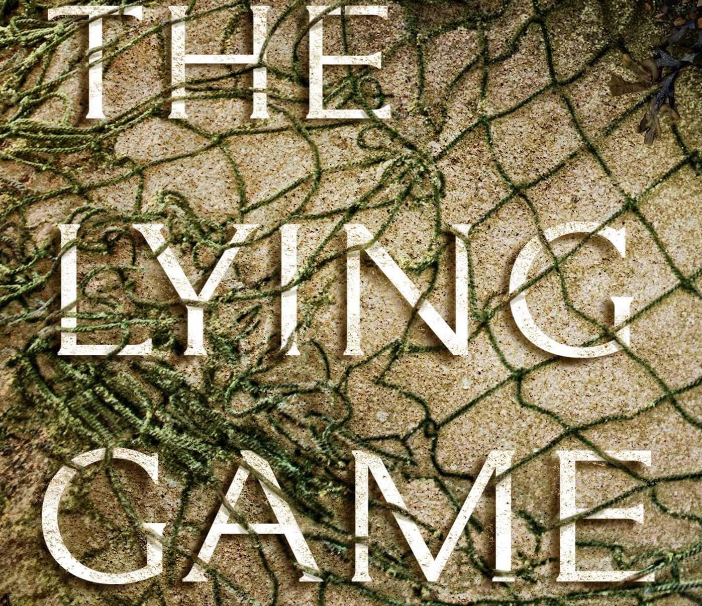 A net in the sand on the cover of The Lying Game