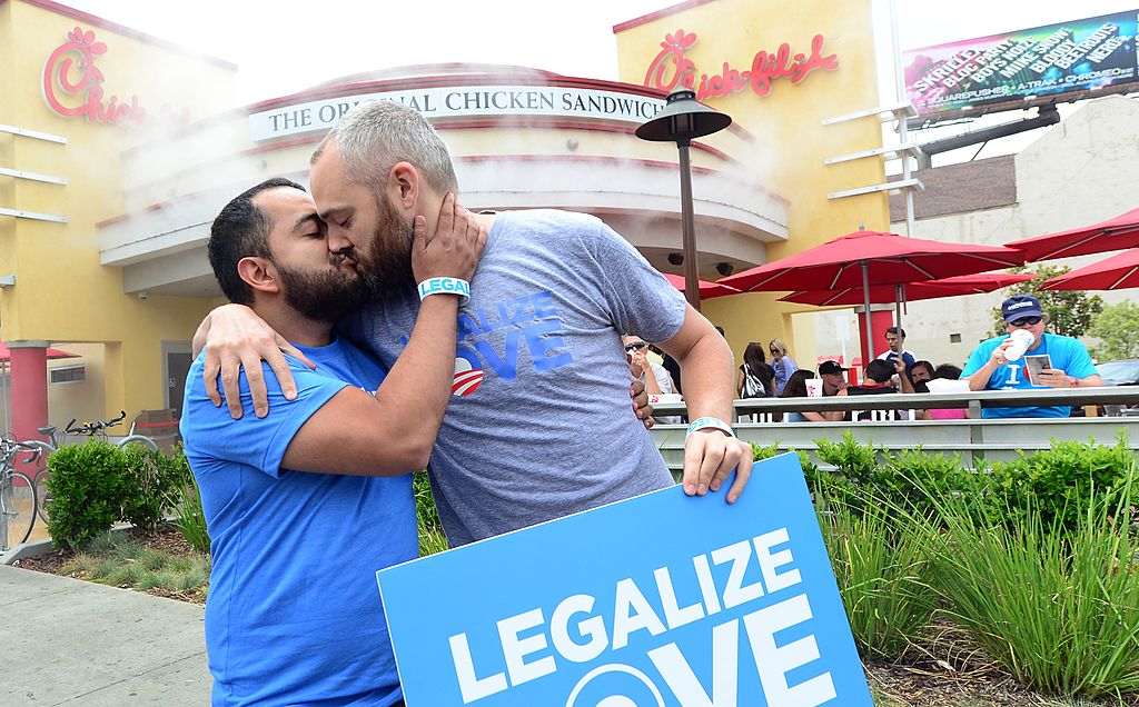 Gays and lesbians staging "kiss-ins" outside Chick-fil-A ou