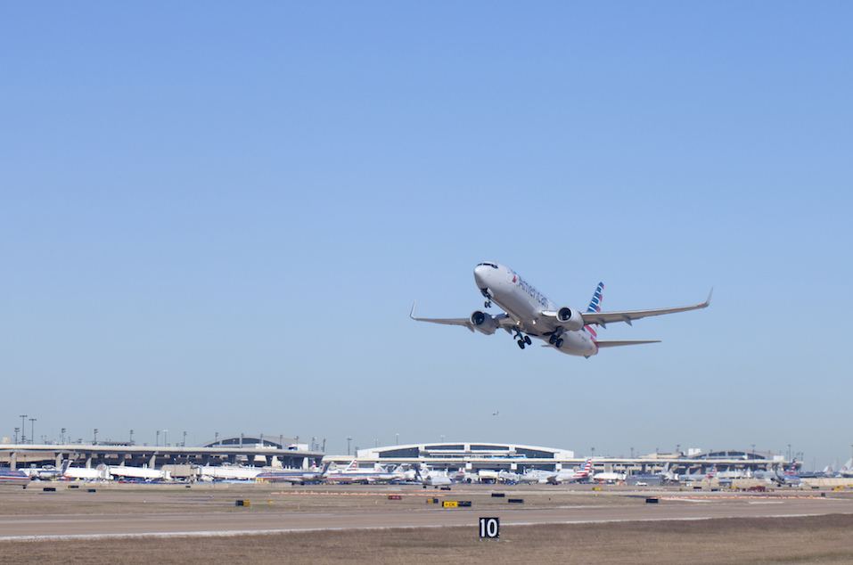 American Airlines airplane taking off at Dallas - Ft Worth (DFW) Airport in Texas.