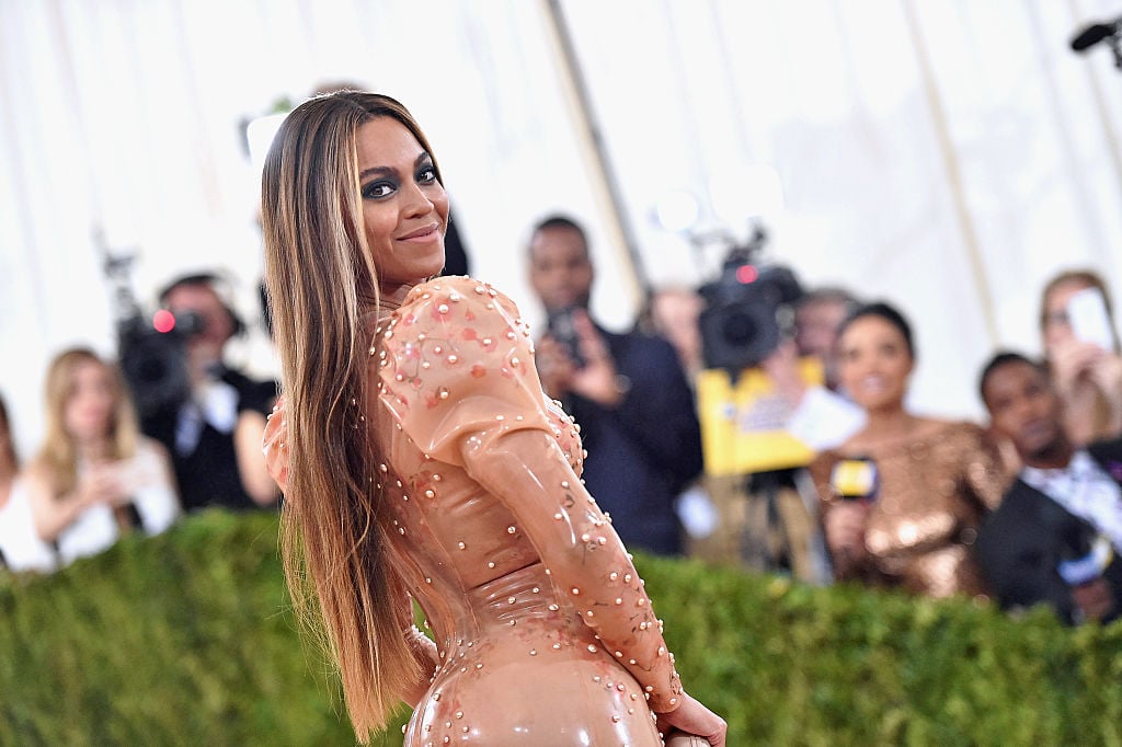 Beyonce poses for photos in a nude gown at the MET Gala.