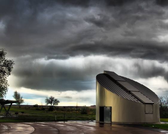 observatory with stormy sky