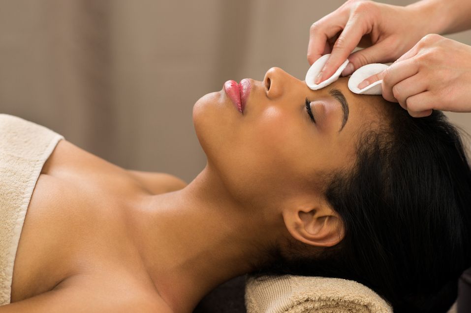 Cleaning face with cotton pads