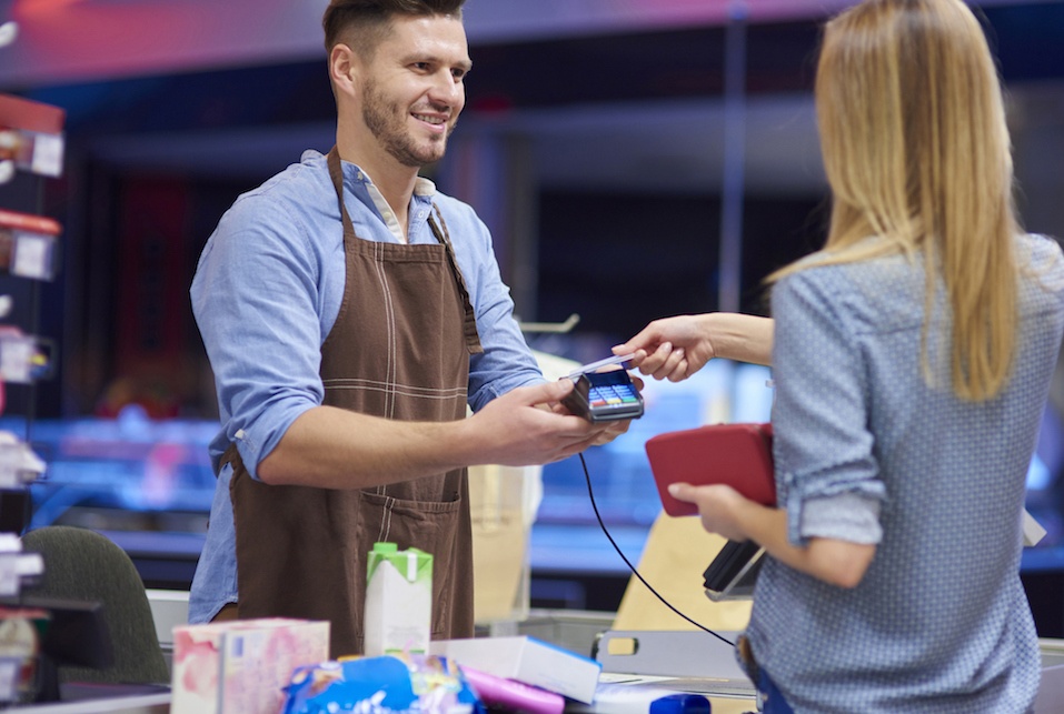 woman paying with card