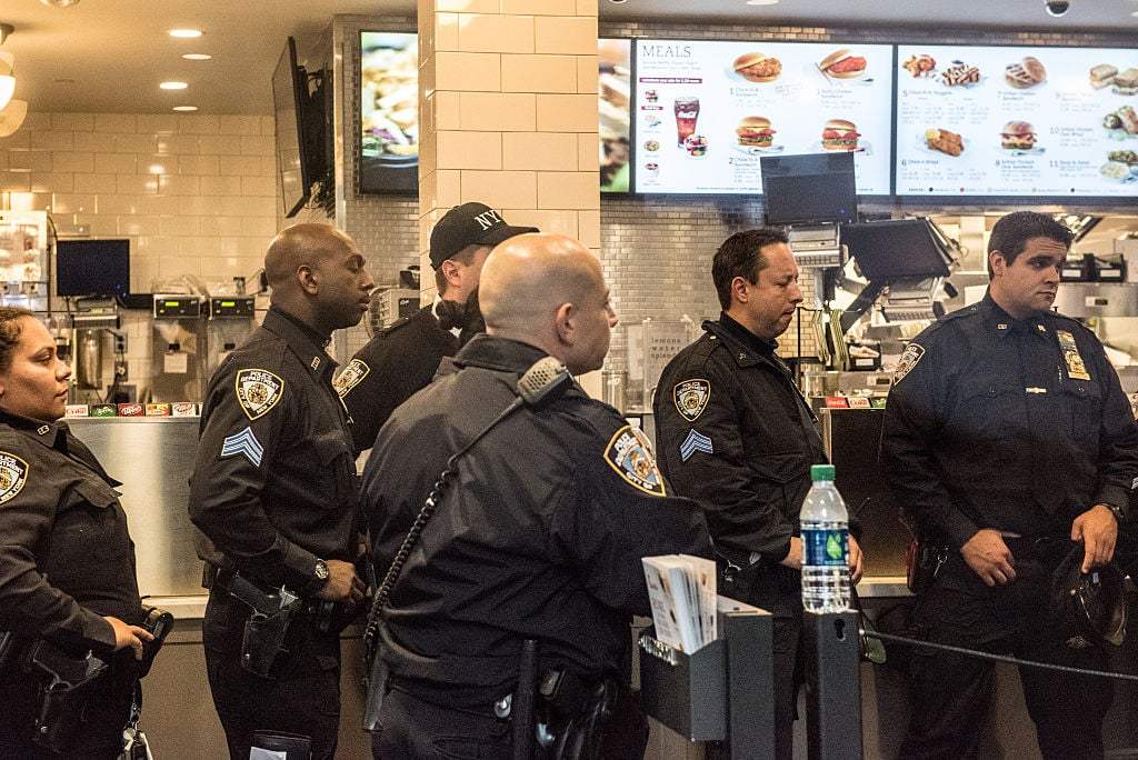 New York Police Department officers have a meeting inside of Chick-Fil-A, a day