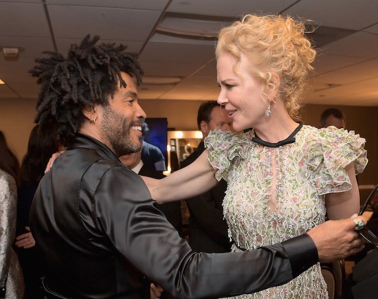Recording artist Lenny Kravitz (L) and actress Nicole Kidman pose in the green room during the Hollywood Film Awards