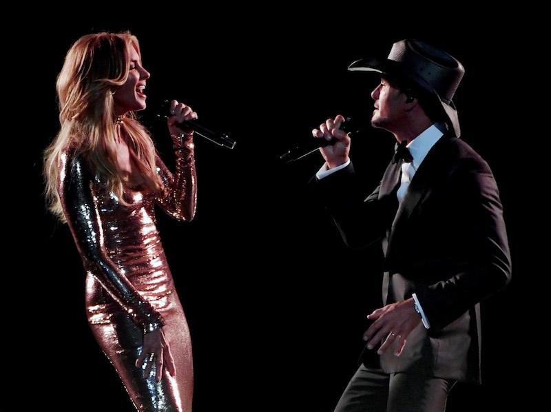 Recording artists Faith Hill (L) and Tim McGraw perform during the 52nd Academy of Country Music Awards