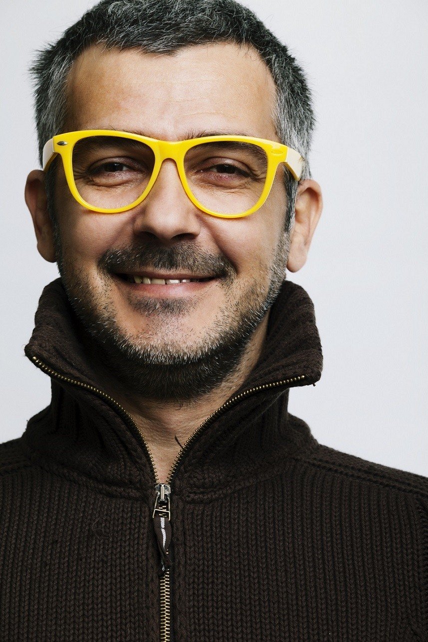 man wearing yellow gllasses