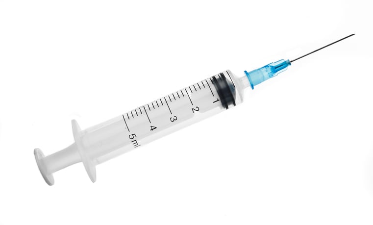 Medical syringe on white background. Medical syringe
