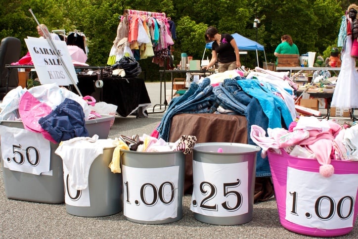 Merchandise Labeled With Prices On Display At Garage Sale