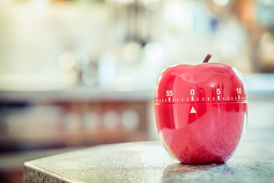 red kitchen timer shaped like apple