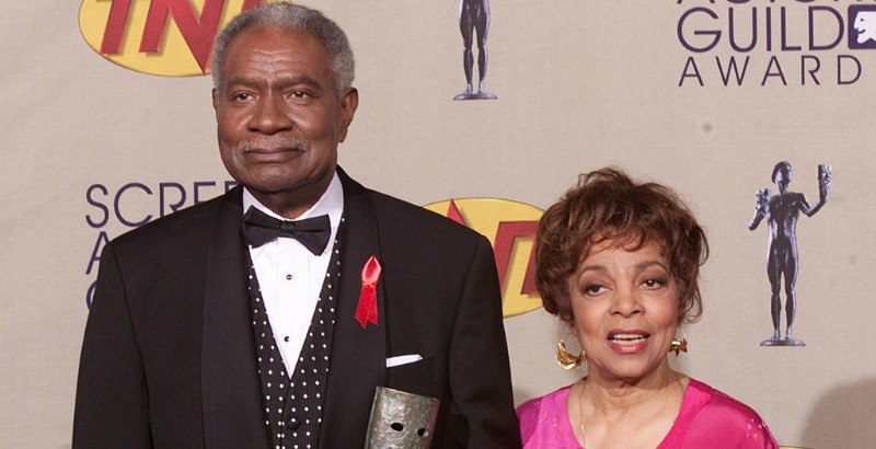 Ossie Davis and Ruby Dee pose together on the red carpet.