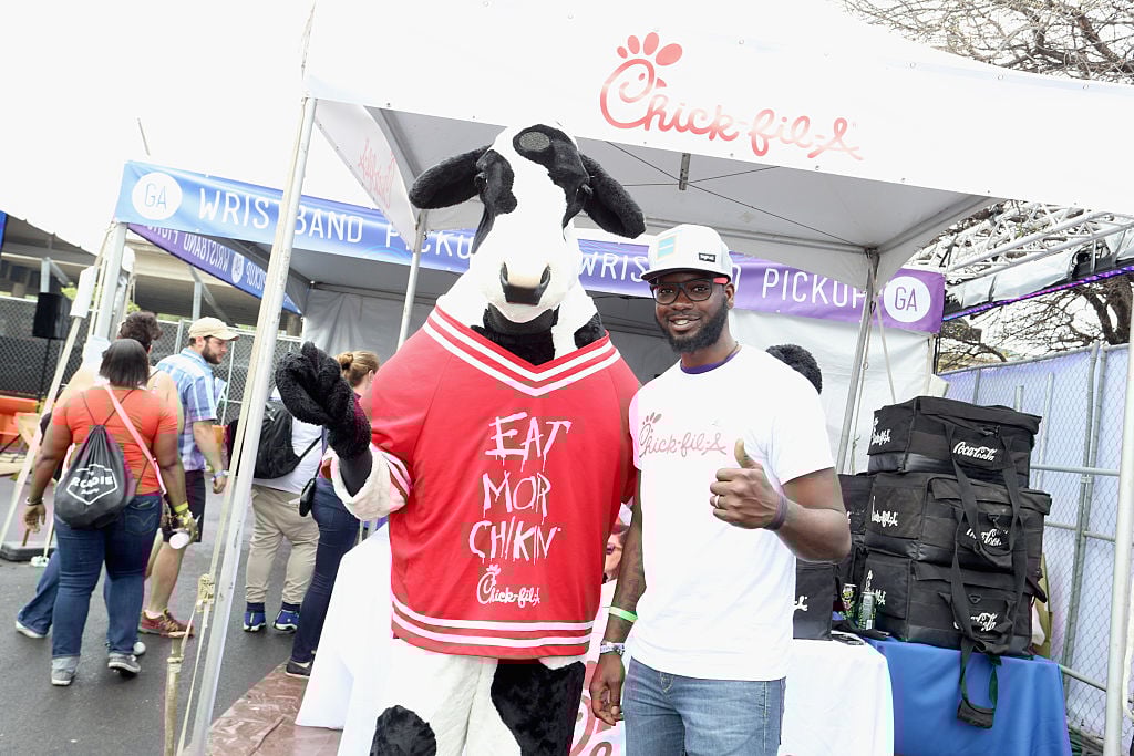 Chick-fil-A cow and brand ambassador attend the PANDORA Discovery Den SXSW