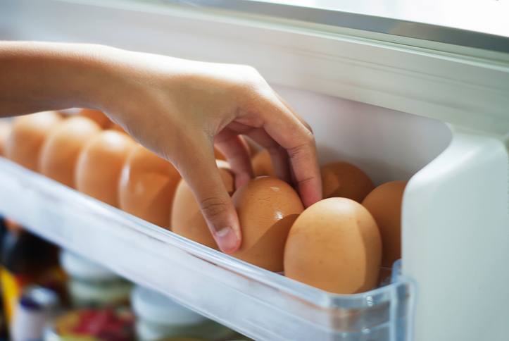 eggs on shelf of refrigerator